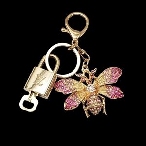 100% Auth Louis Vuitton Lock & Key with unbranded Bagcharm, Keycharm, Keychain